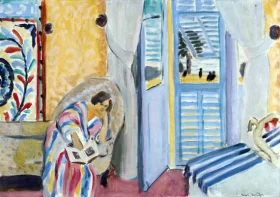 Interiéur à Nice, femme assise avec un livre