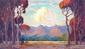 A View of Mountains Through Trees