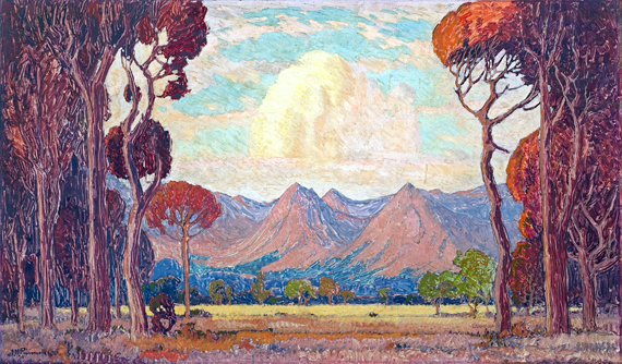 A View of Mountains Through Trees
