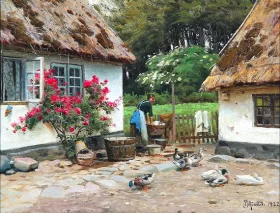 Summer idyll by a thatched farmhouse with a woman washing clothes 1922