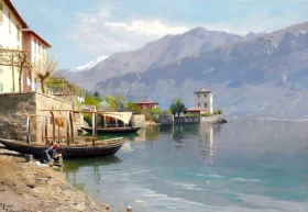 Calm sunny day at Lake Como. A young girl washes clothes 1920