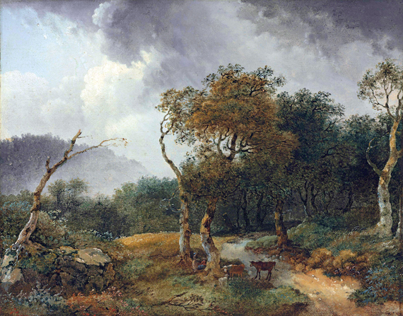 A wooded landscape with milkmaids and their cattle sheltering from a shower