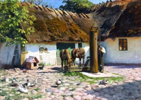 The horses are watered at the pump in the yard 1923