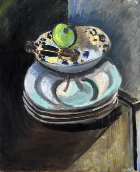 Nature morte with plates, fruit bowl and nutcracker