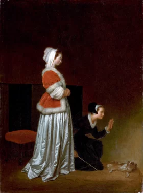 A lady and her maid chastising a spaniel