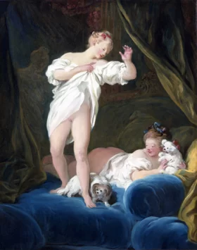 Two girls on a bed playing with their dogs