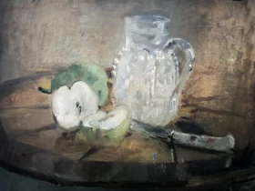Pomme coupée et pichet