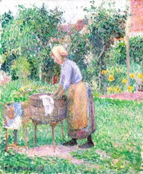 A Washerwoman at Éragny 1893 by Camille Pissarro A Washerwoman at Éragny 1893 by Camille Pissarro