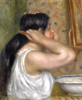 The Toilette, Woman Combing Her Hair by Pierre Auguste Renoir