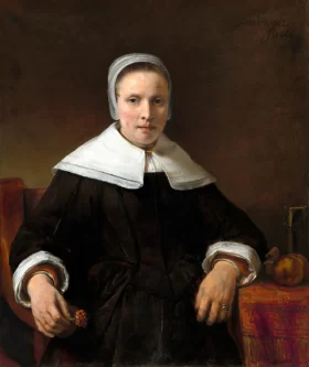 A Woman Holding a Pink flower 1656 by Rembrandt