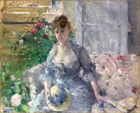 Young Woman Seated on a Sofa 1879 by Berthe Morisot Young Woman Seated on a Sofa 1879 by Berthe Morisot
